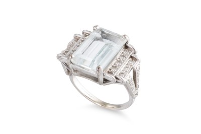 Lot 77 - A TOPAZ AND DIAMOND RING, the rectangular...
