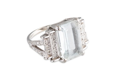 Lot 77 - A TOPAZ AND DIAMOND RING, the rectangular...