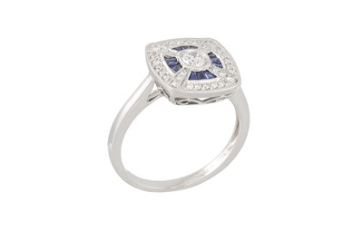 Lot 69 - A DIAMOND AND SAPPHIRE RING, of square plaque...