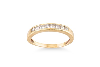 Lot 176 - A DIAMOND HALF HOOP RING, set with eight...