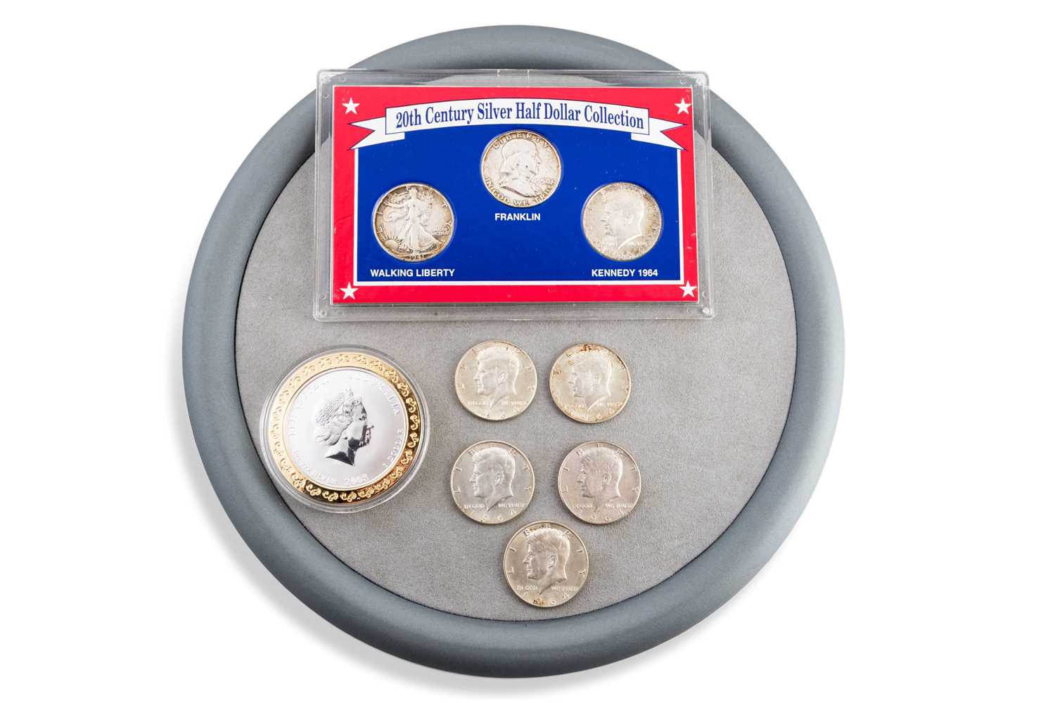 Lot 458 - A COLLECTION OF EIGHT US SILVER $½ COINS, a...