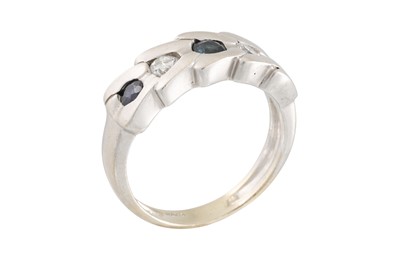 Lot 78 - A DIAMOND AND SAPPHIRE RING, set with three...