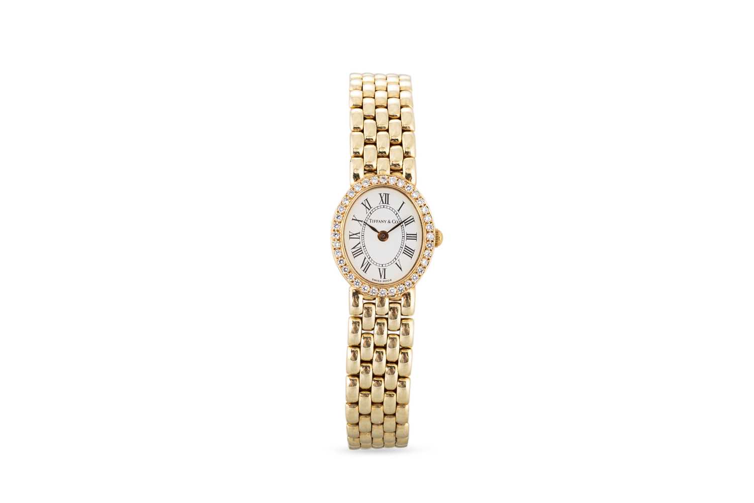 Lot 390 - A LADY'S 14CT YELLOW GOLD AND DIAMOND TIFFANY...