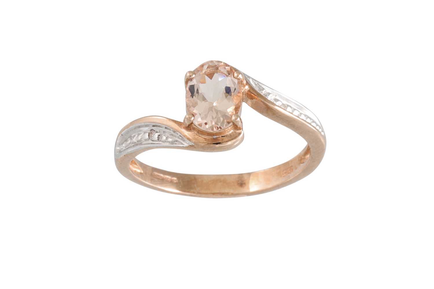 Lot 80 - A MORGANITE AND DIAMOND RING, the oval...