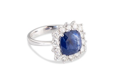 Lot 321 - A SAPPHIRE AND DIAMOND SET CLUSTER RING, the...