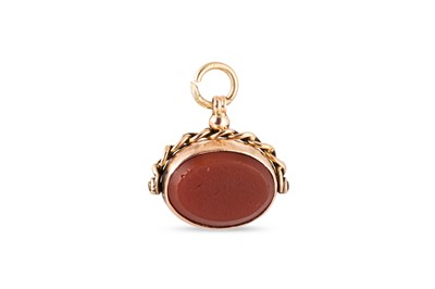 Lot 21 - AN ANTIQUE SWIVEL SEAL, set with bloodstone...
