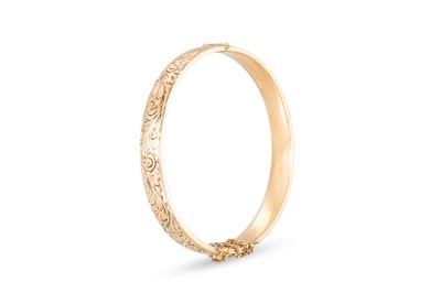 Lot 52 - A 9CT GOLD CORE METAL BANGLE, together with a...