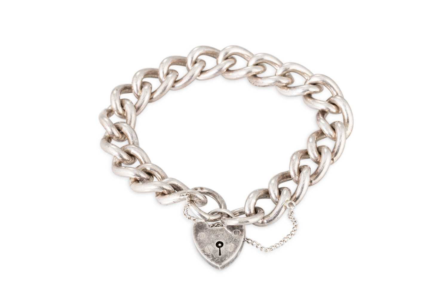 Lot 56 - A STERLING SILVER CURB BRACELET, with padlock...