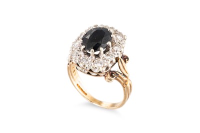 Lot 80 - A SAPPHIRE AND DIAMOND CLUSTER RING, the...