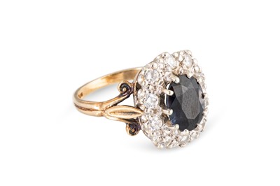 Lot 80 - A SAPPHIRE AND DIAMOND CLUSTER RING, the...