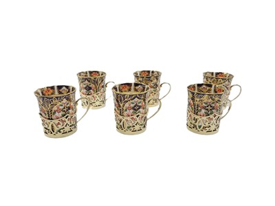 Lot 515 - A CASED SET OF SIX ANTIQUE SILVER GILT MOUNTED...