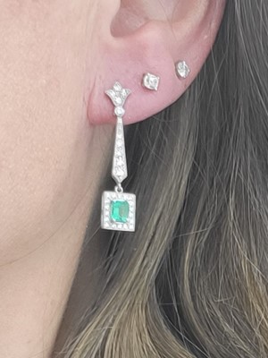 Lot 287 - A PAIR OF EMERALD AND DIAMOND DROP EARRINGS,...