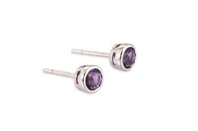 Lot 86 - A PAIR OF AMETHYST EARRINGS, the collet set...