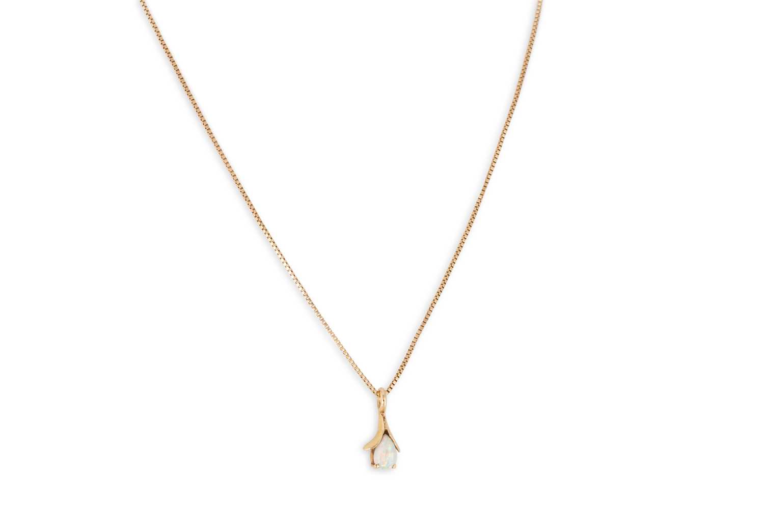 Lot 88 - AN OPAL PENDANT, the teardrop cabochon opal...