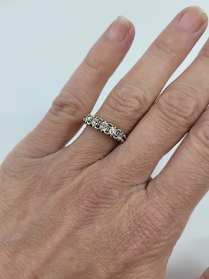 Lot 99 - A VINTAGE FIVE STONE DIAMOND RING, the...
