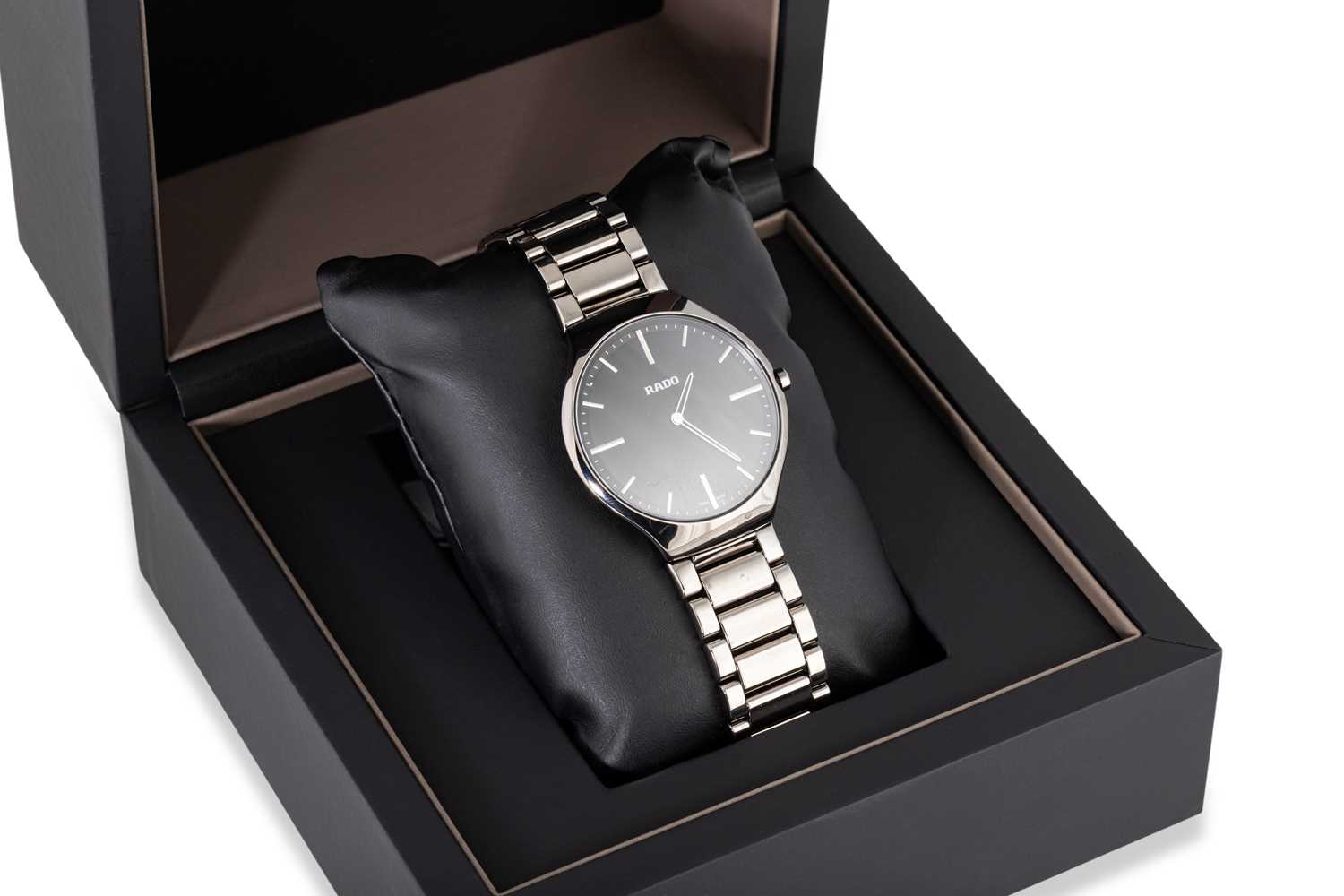 Lot 397 - A GENT'S CERAMIC RADO WRISTWATCH, black dial,...