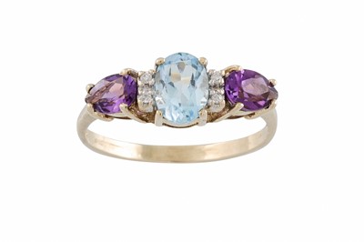 Lot 41 - A VINTAGE MULTI - GEM SET DRESS RING, mounted...