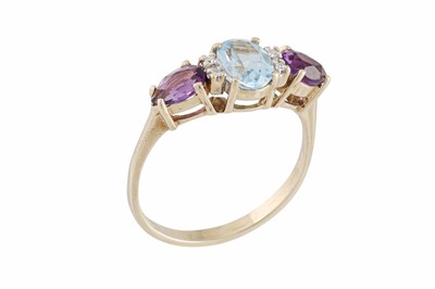Lot 41 - A VINTAGE MULTI - GEM SET DRESS RING, mounted...