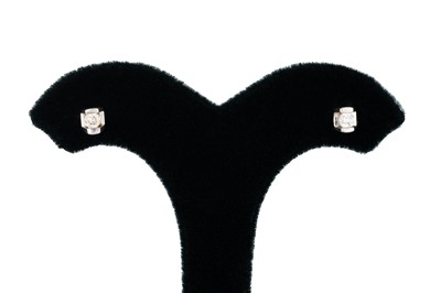 Lot 11 - A PAIR OF DIAMOND STUD EARRINGS, the round cut...