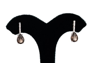 Lot 85 - A PAIR OF 9CT GOLD SMOKEY QUARTZ AND DIAMOND...