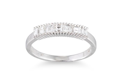 Lot 121 - A DIAMOND HALF ETERNITY RING, the princess cut...