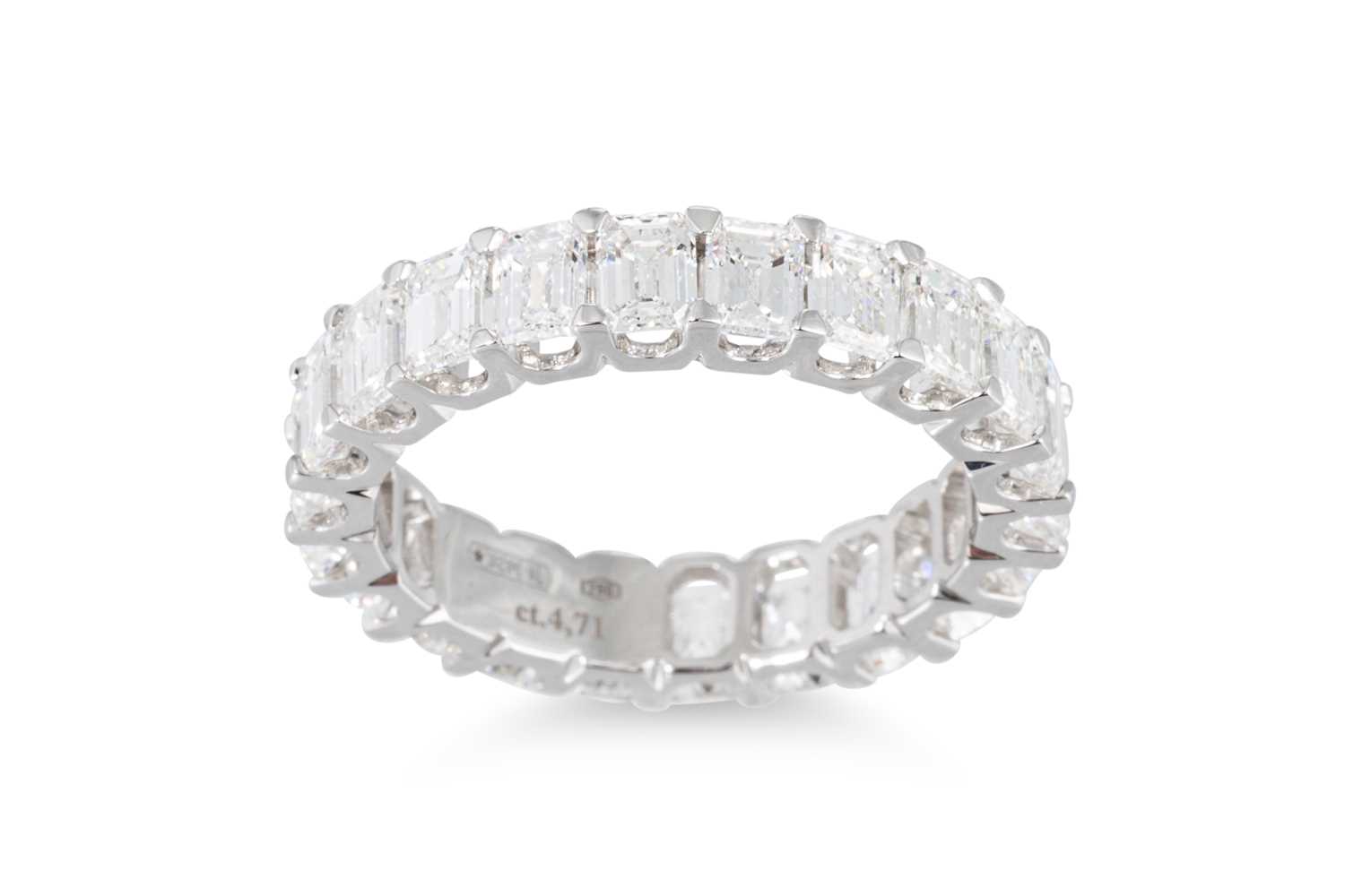 Lot 312 - AN EMERALD CUT DIAMOND FULL BANDED ETERNITY...