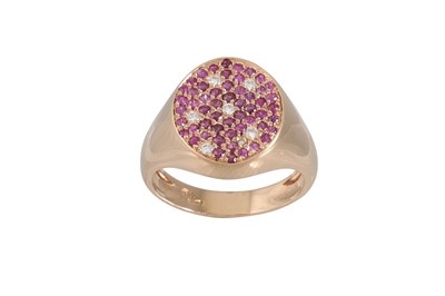 Lot 258 - A RUBY AND DIAMOND PAVÉ SET RING, mounted in...