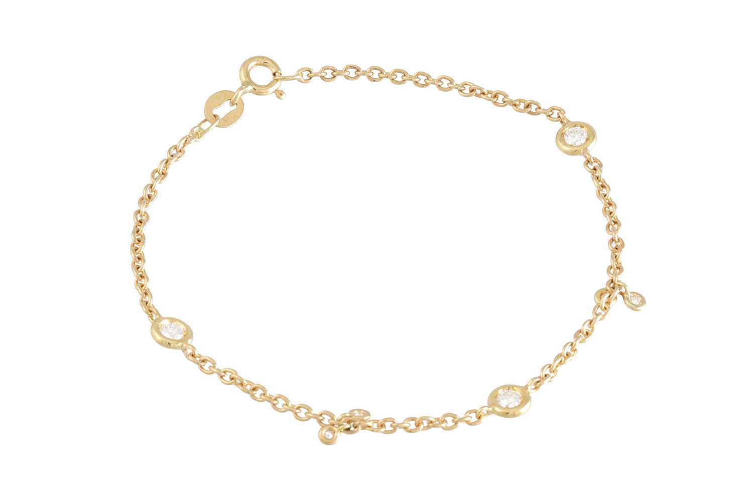 Lot 264 - A DIAMOND 18CT BRACELET, the collet set...