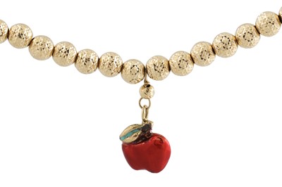 Lot 267 - A GOLD BEADED BRACELET, suspending enameled...
