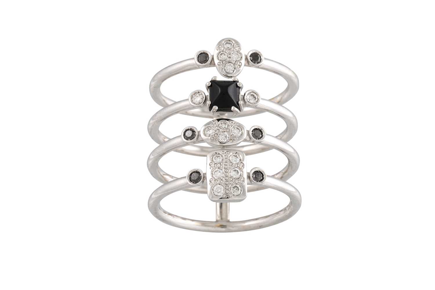 Lot 275 - A DIAMOND AND SAPPHIRE LINK RING, in stack...