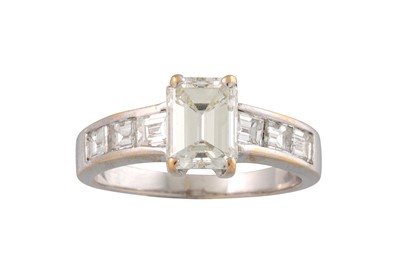 Lot 198 - A DIAMOND SOLITAIRE RING, the emerald cut...