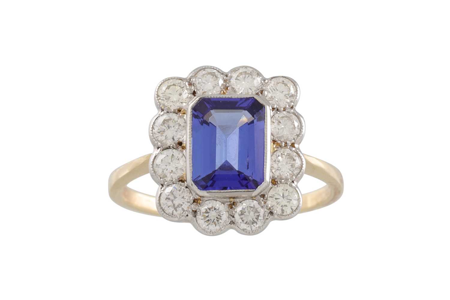 Lot 84 - A DIAMOND AND TANZANITE RING, the rectangular...