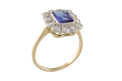 Lot 84 - A DIAMOND AND TANZANITE RING, the rectangular...