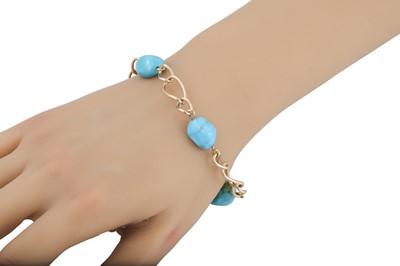 Lot 196 - A TURQUOISE AND GOLD BRACELET, open work links,...