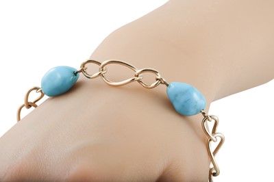 Lot 196 - A TURQUOISE AND GOLD BRACELET, open work links,...