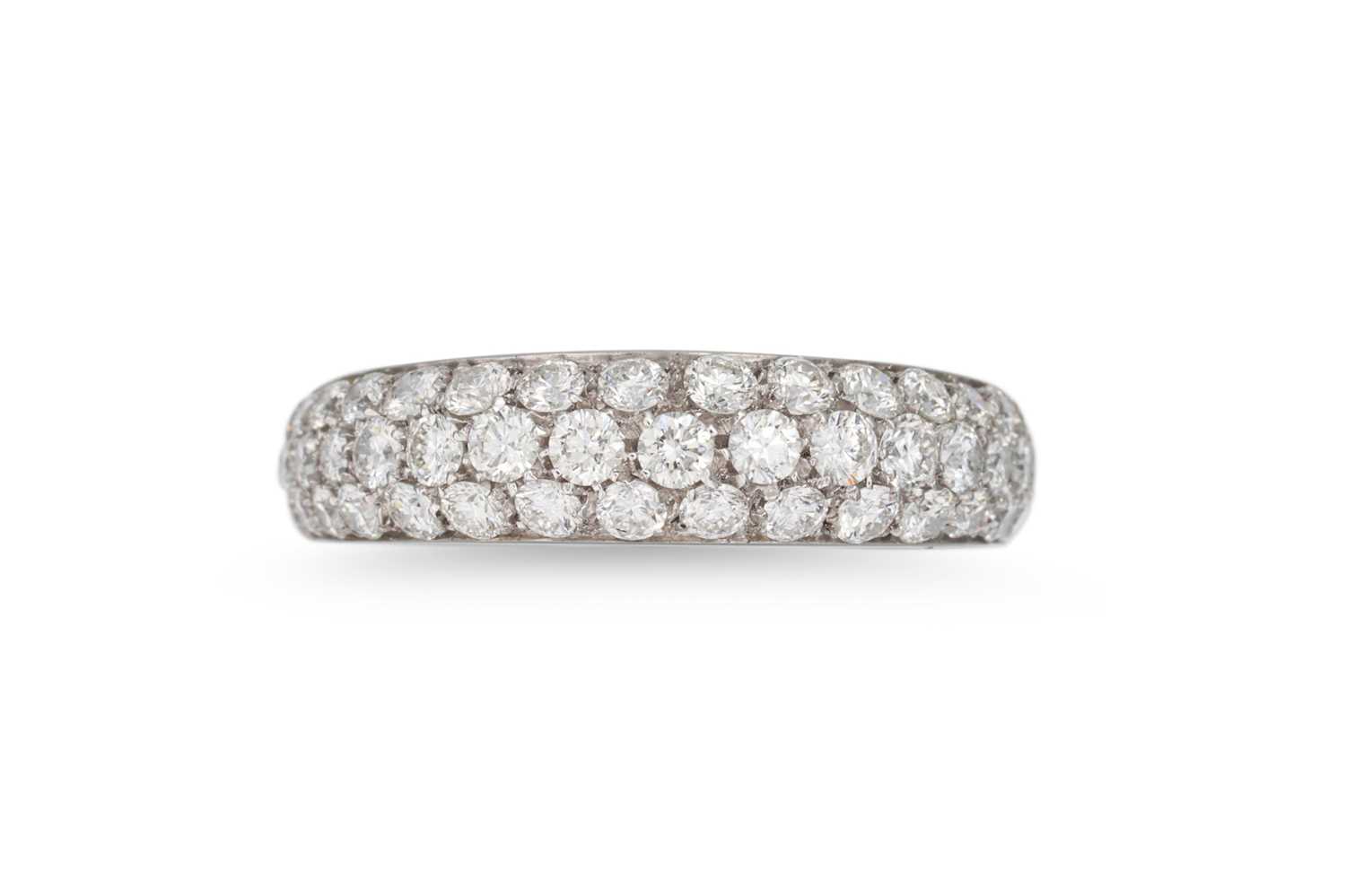 Lot 218 - A DIAMOND PAVE SET BAND RING, mounted in 18ct...