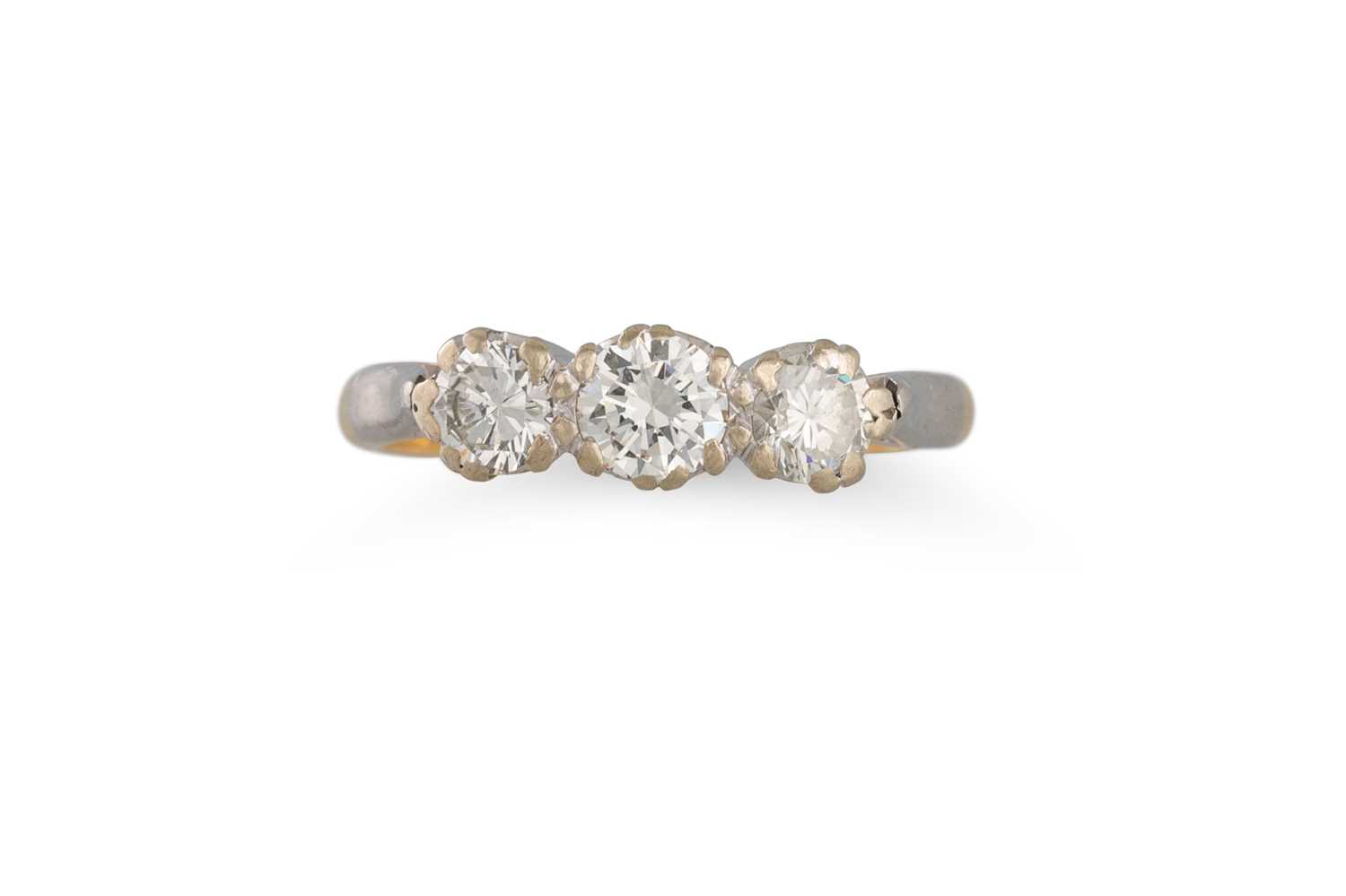 Lot 1 - A THREE STONE DIAMOND RING, the brilliant cut...