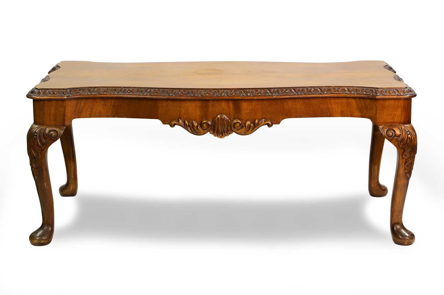 Lot 494 - A SHAPED BURR WALNUT COFFEE TABLE, serpentine...